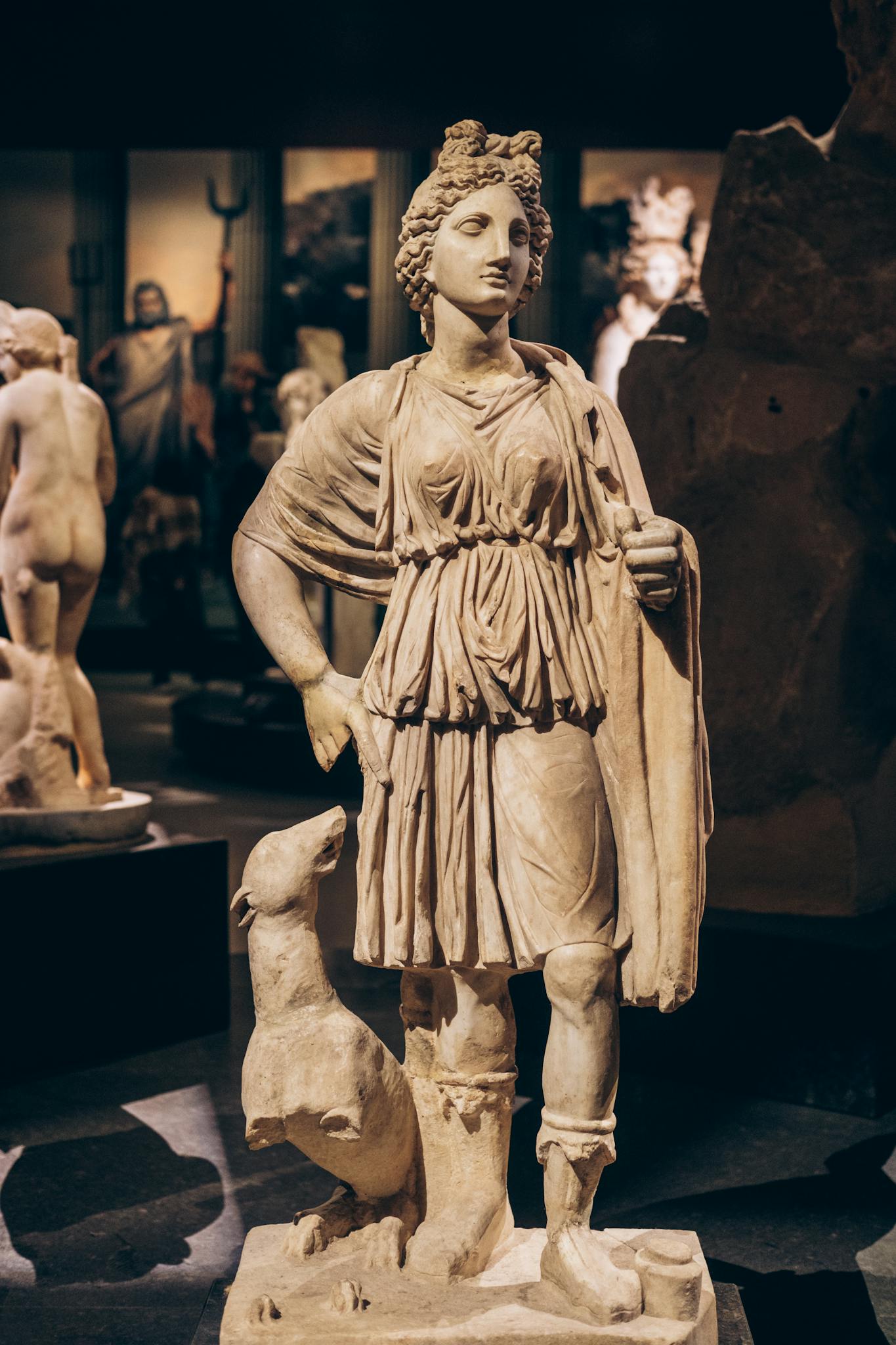 Elegant ancient Greek statue captured in a Turkish museum setting.
